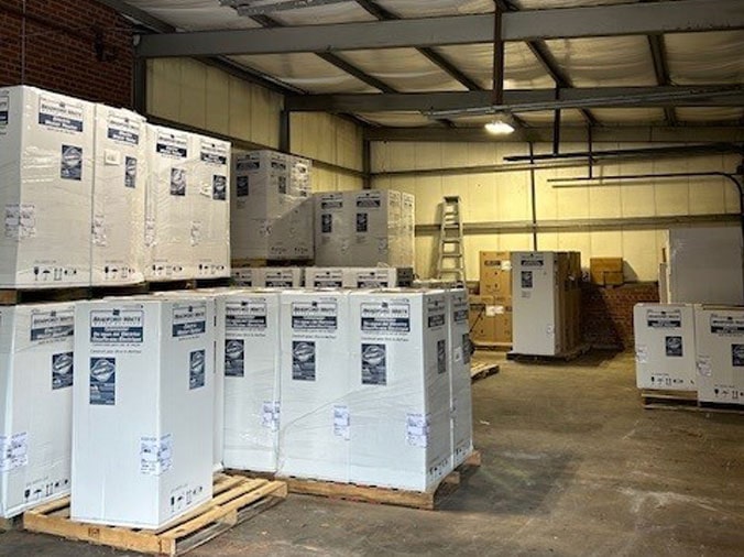 Numerous boked water heaters in the Hughes Supply Salisbury warehouse