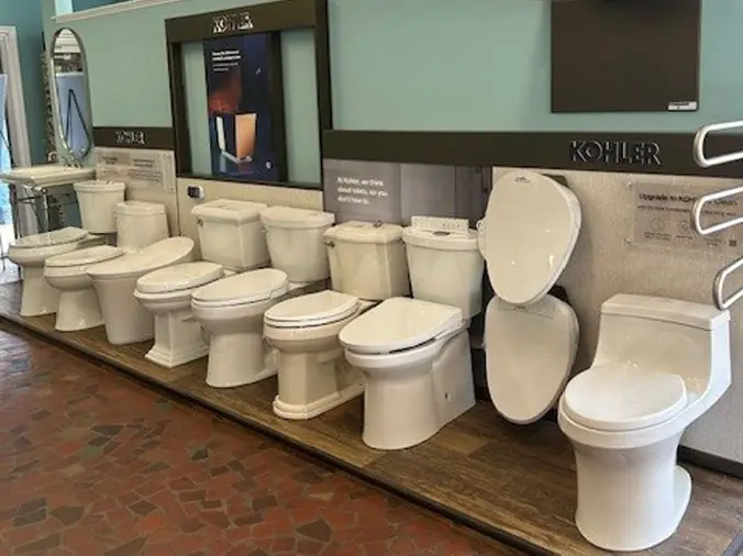 Multiple variations of toilets on display in the Hughes Supply Salisbury showroom